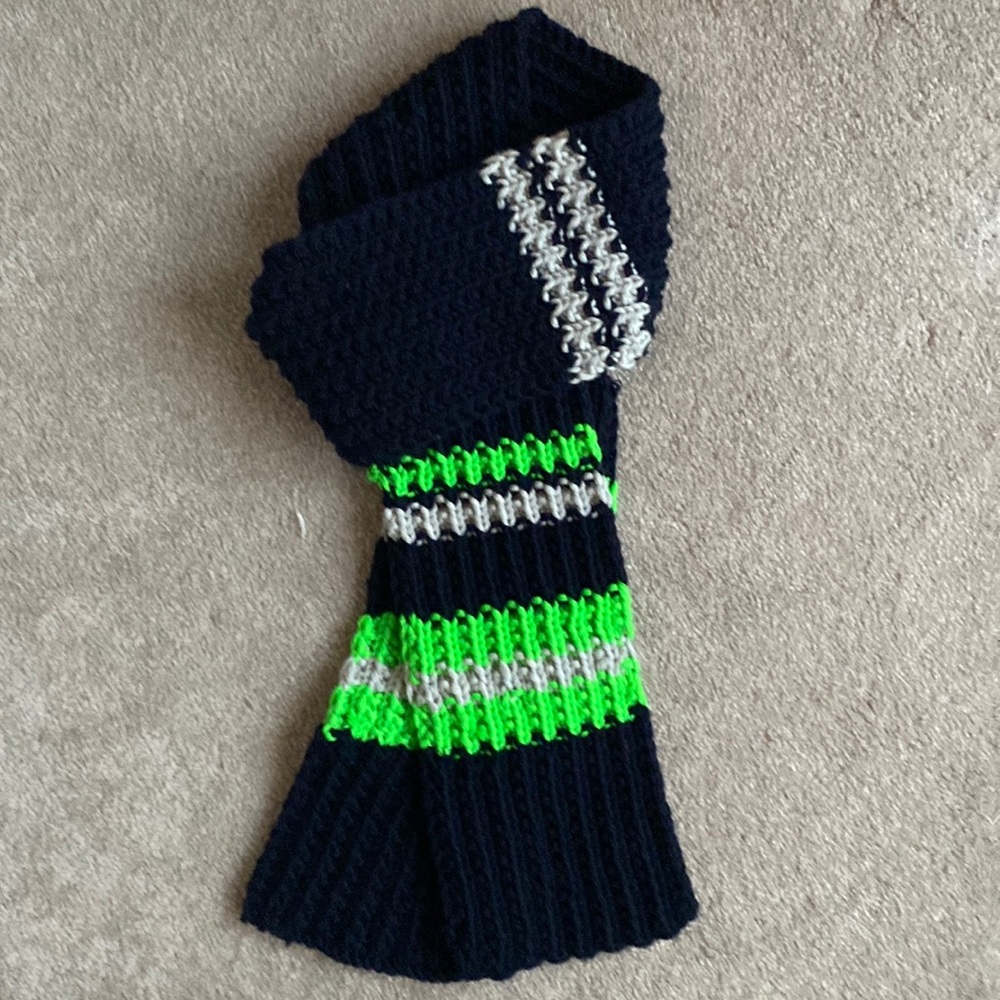 Beautiful hand knit Seattle Seahawks scarf. Approx 62” long x 5 1/2” wide